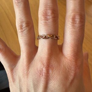 Tiffany Infinity narrow band ring in RUBEDO™ metal.
Ring